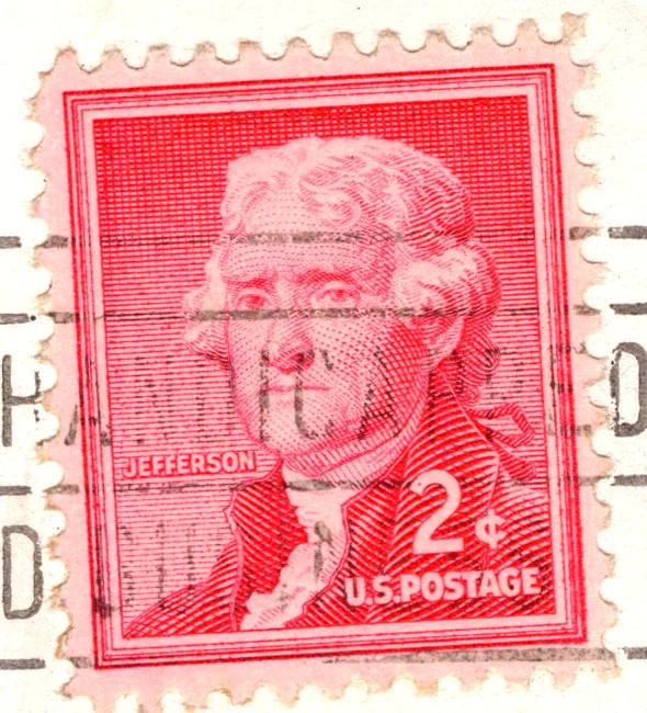 A 2-cent carmine rose Thomas Jefferson stamp of the Liberty series on a postcard, from the Postcard Origins collection